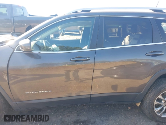 2019 Jeep Cherokee Latitude Plus with VIN 1C4PJMLB3KD424994, listed as a IAAI auction lot 41506691 with 87,912 mi miles and . Bid and sale history available at DreamBid. Image 14.