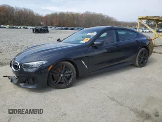 2020 BMW 8 Series 840i z VIN WBAGV4C0XLCD97822, wystawiony jako Copart lot #52265065 z przebiegiem Nie podano mil oraz Tytuł czysty. Historia ofert i sprzedaży dostępna na DreamBid. Obrazek 1.