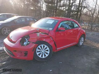2019 Volkswagen Beetle S with VIN 3VWFD7AT1KM712384, listed as a IAAI auction lot 41505127 with 49,527 mi miles. Bid and sale history available at carsss.com. Image 2.