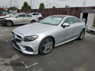 2018 Mercedes-Benz E 400 with VIN WDD1J6GB8JF018987, listed as a Copart auction lot 58561465 with 70,198 mi miles and Salvage title. Bid and sale history available at DreamBid. Image 1.