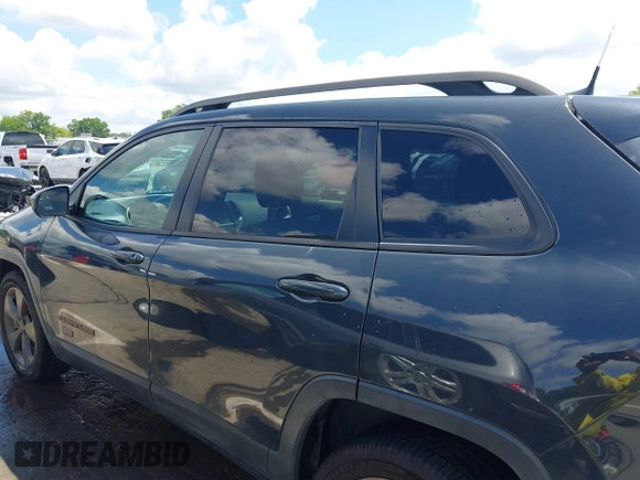 2016 Jeep Cherokee Latitude with VIN 1C4PJLCBXGW284156, listed as a IAAI auction lot 42264152 with 117,327 mi miles and . Bid and sale history available at DreamBid. Image 14.