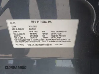 2023 Tesla Model Y Long Range z VIN 7SAYGDEE6PA169168, wystawiony jako IAAI lot #42050428 z przebiegiem 26 731 mil mil oraz . Historia ofert i sprzedaży dostępna na DreamBid. Obrazek 9.
