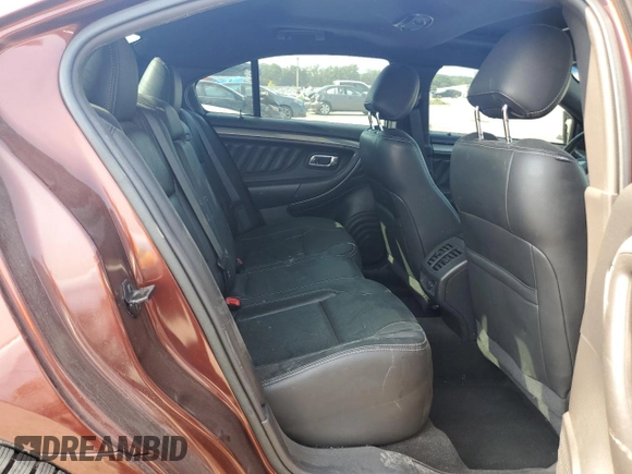 2015 Ford Taurus SEL with VIN 1FAHP2E96FG161735, listed as a Copart auction lot 61865294 with 148,070 mi miles and Salvage Title. Bid and sale history available at DreamBid. Image 10.