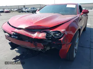 2021 Chevrolet Camaro 1LT with VIN 1G1FB1RX9M0107010, listed as a IAAI auction lot 42629591 with 65,450 mi miles and . Bid and sale history available at DreamBid. Image 6.