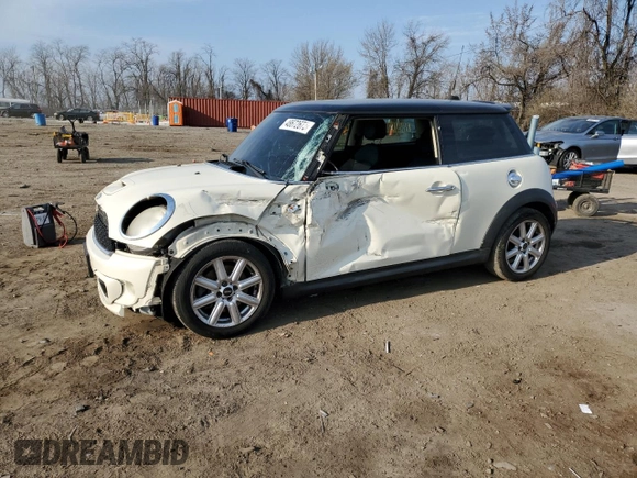 2011 MINI Hardtop S with VIN WMWSV3C59BTY23205, listed as a Copart auction lot 48672675 with 120,457 mi miles and Salvage Title. Bid and sale history available at DreamBid. Image 1.