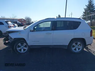 2014 Jeep Compass Latitude with VIN 1C4NJCEB0ED660019, listed as a IAAI auction lot 41200065 with 185,174 mi miles. Bid and sale history available at carsss.com. Image 14.