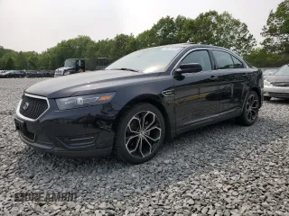 2016 Ford Taurus SHO z VIN 1FAHP2KT4GG118397, wystawiony jako Copart lot #59911415 z przebiegiem 136 530 mil mil oraz Czysty tytuł • Clean title. Historia ofert i sprzedaży dostępna na DreamBid. Obrazek 1.