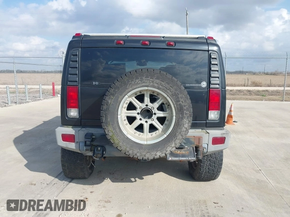 2006 Hummer H2 with VIN 5GRGN23U66H120601, listed as a IAAI auction lot 41524634 with 155,003 mi miles. Bid and sale history available at carsss.com. Image 16.
