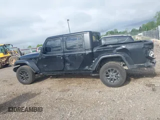 2022 Jeep Gladiator Texas Trail with VIN 1C6HJTAG7NL125006, listed as a IAAI auction lot 42288180 with 96,694 mi miles and . Bid and sale history available at DreamBid. Image 14.
