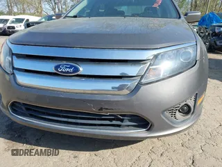2012 Ford Fusion SE z VIN 3FAHP0HA4CR306608, wystawiony jako IAAI lot #41939924 z przebiegiem 176 689 mil mil oraz . Historia ofert i sprzedaży dostępna na DreamBid. Obrazek 6.