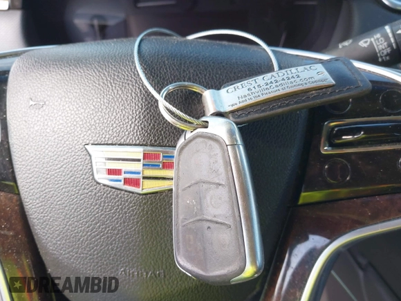 2016 Cadillac XTS Luxury Collection z VIN 2G61M5S33G9107107, wystawiony jako IAAI lot #42072608 z przebiegiem 130 542 mil mil oraz . Historia ofert i sprzedaży dostępna na DreamBid. Obrazek 11.