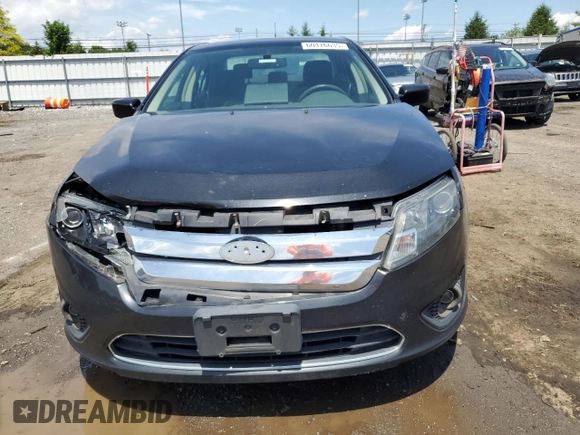 2012 Ford Fusion SE z VIN 3FAHP0HA7CR306411, wystawiony jako Copart lot #60476635 z przebiegiem 173 779 mil mil oraz Szkoda całkowita • Salvage title. Historia ofert i sprzedaży dostępna na DreamBid. Obrazek 5.