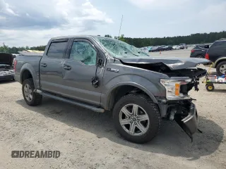 2018 Ford F-150 XL with VIN 1FTEW1E54JFD50664, listed as a Copart auction lot 57517945 with 106,649 mi miles and Salvage title. Bid and sale history available at DreamBid. Image 4.