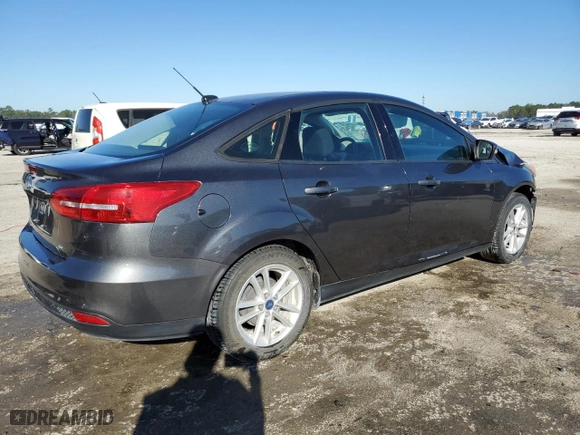 2017 Ford Focus SE with VIN 1FADP3F26HL315456, listed as a Copart auction lot 47047165 with 98,950 mi miles and Salvage Title. Bid and sale history available at carsss.com. Image 3.