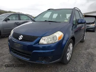 2011 Suzuki SX4 Crossover with VIN JS2YB5A31B6304110, listed as a IAAI auction lot 42023959 with 127,730 mi miles. Bid and sale history available at carsss.com. Image 6.