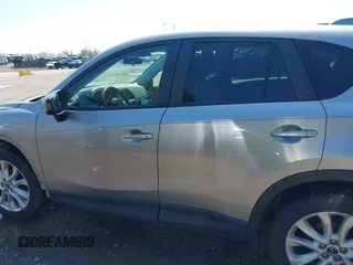 2013 Mazda CX-5 Grand Touring with VIN JM3KE4DE9D0137085, listed as a IAAI auction lot 41978534 with 103,720 mi miles and . Bid and sale history available at carsss.com. Image 15.