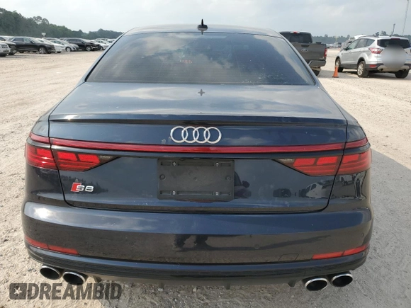 2020 Audi S8 z VIN WAU8SAF82LN003857, wystawiony jako Copart lot #56081794 z przebiegiem 11 298 mil mil oraz Szkody całkowita. Historia ofert i sprzedaży dostępna na DreamBid. Obrazek 6.