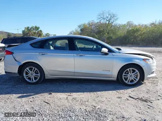 2018 Ford Fusion Hybrid S with VIN 3FA6P0UU8JR244912, listed as a IAAI auction lot 41742940 with 65,885 mi miles. Bid and sale history available at carsss.com. Image 13.
