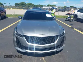 2023 Cadillac CT5 Luxury z VIN 1G6DW5RK3P0106764, wystawiony jako IAAI lot #42491584 z przebiegiem 32 223 mil mil oraz . Historia ofert i sprzedaży dostępna na DreamBid. Obrazek 12.