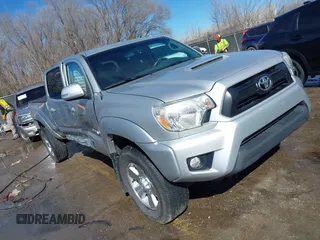 2013 Toyota Tacoma with VIN 3TMMU4FN8DM054973, listed as a IAAI auction lot 41659232 with 113,734 mi miles. Bid and sale history available at carsss.com. Image 1.