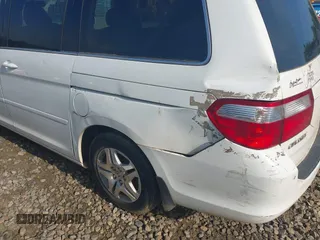 2007 Honda Odyssey EX-L z VIN 5FNRL38617B415770, wystawiony jako IAAI lot #42208632 z przebiegiem 269 375 mil mil oraz . Historia ofert i sprzedaży dostępna na DreamBid. Obrazek 6.