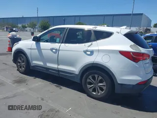 2016 Hyundai Santa Fe z VIN 5XYZT3LB9GG322900, wystawiony jako IAAI lot #42417788 z przebiegiem 160 621 mil mil oraz . Historia ofert i sprzedaży dostępna na DreamBid. Obrazek 3.