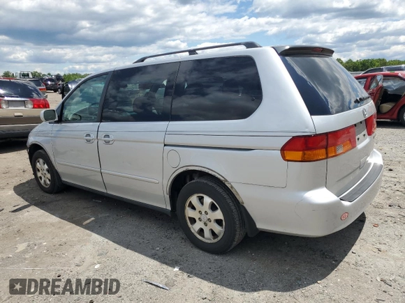 2003 Honda Odyssey EX z VIN 5FNRL186X3B075761, wystawiony jako Copart lot #58289815 z przebiegiem 137 763 mil mil oraz Szkoda całkowita • Salvage title. Historia ofert i sprzedaży dostępna na DreamBid. Obrazek 2.