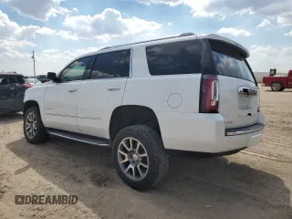 2016 GMC Yukon Denali with VIN 1GKS2CKJ5GR282446, listed as a Copart auction lot 68660254 with 122,751 mi miles and Salvage Title. Bid and sale history available at carsss.com. Image 2.