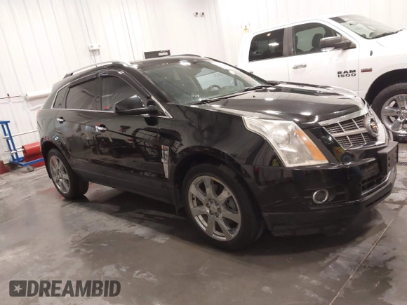 2011 Cadillac SRX Performance Collection with VIN 3GYFNEEY9BS675746, listed as a IAAI auction lot 41735676 with 113,079 mi miles and . Bid and sale history available at carsss.com. Image 1.