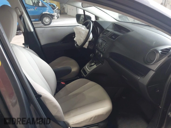 2014 Mazda 5 Sport z VIN JM1CW2BLXE0164748, wystawiony jako IAAI lot #42064606 z przebiegiem 140 169 mil mil oraz . Historia ofert i sprzedaży dostępna na DreamBid. Obrazek 5.