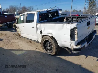 2015 Chevrolet Colorado 4WD Z71 with VIN 1GCGTCE3XF1207119, listed as a IAAI auction lot 41179141 with Not provided miles and . Bid and sale history available at DreamBid. Image 3.