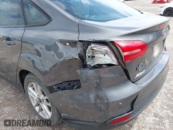 2016 Ford Focus SE with VIN 1FADP3F20GL202777, listed as a IAAI auction lot 42077501 with 116,351 mi miles and . Bid and sale history available at DreamBid. Image 6.