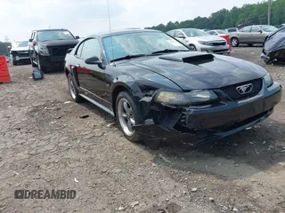 2003 Ford Mustang GT Deluxe with VIN 1FAFP42X93F366330, listed as a IAAI auction lot 42385553 with 208,440 mi miles and . Bid and sale history available at DreamBid. Image 1.