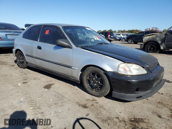 1998 Honda Civic CX with VIN 2HGEJ6325WH112575, listed as a Copart auction lot 77186644 with 147,976 mi miles and Salvage Title. Bid and sale history available at carsss.com. Image 4.