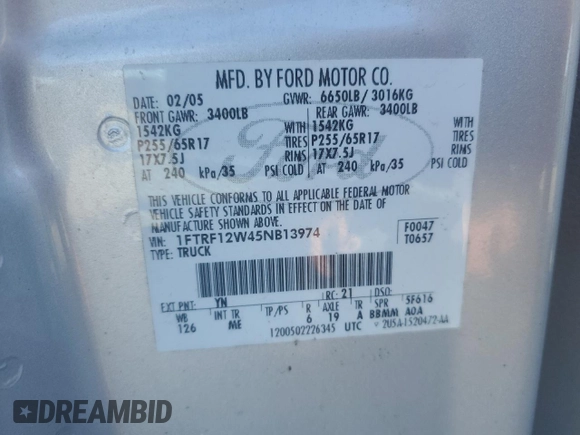2005 Ford F-150 XL with VIN 1FTRF12W45NB13974, listed as a Copart auction lot 55701635 with 385,185 mi miles and Salvage title. Bid and sale history available at DreamBid. Image 12.