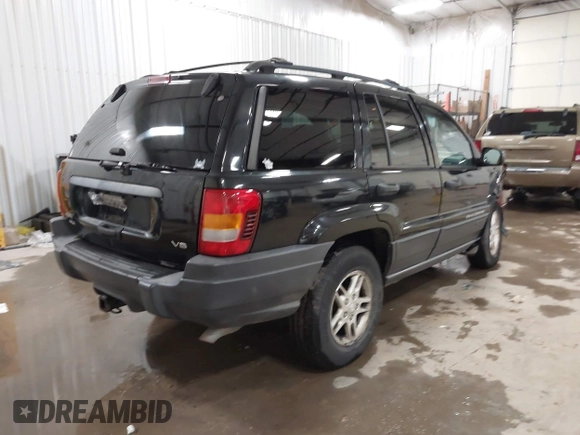 2004 Jeep Grand Cherokee Laredo with VIN 1J4GW48N84C367215, listed as a IAAI auction lot 41352098 with 165,485 mi miles and . Bid and sale history available at DreamBid. Image 4.