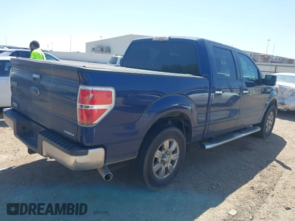 2012 Ford F-150 XL with VIN 1FTFW1CF8CFC40090, listed as a IAAI auction lot 41980374 with 222,869 mi miles. Bid and sale history available at carsss.com. Image 4.