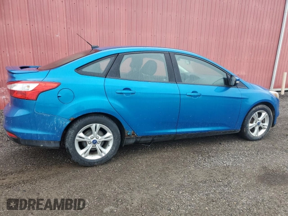 2013 Ford Focus SE z VIN 1FADP3F21DL310739, wystawiony jako Copart lot #57679325 z przebiegiem 225 860 mil mil oraz Czysty tytuł • Clean title. Historia ofert i sprzedaży dostępna na DreamBid. Obrazek 3.