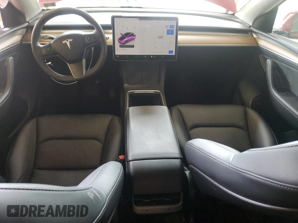 2023 Tesla Model Y Long Range z VIN 7SAYGAEE8PF701618, wystawiony jako Copart lot #57573875 z przebiegiem 39 463 mil mil oraz Szkoda całkowita • Salvage title. Historia ofert i sprzedaży dostępna na DreamBid. Obrazek 8.