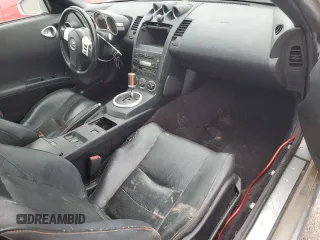 2004 Nissan 350Z Touring z VIN JN1AZ34E44T061263, wystawiony jako Copart lot #55530795 z przebiegiem 126 215 mil mil oraz Czysty tytuł • Clean title. Historia ofert i sprzedaży dostępna na DreamBid. Obrazek 8.