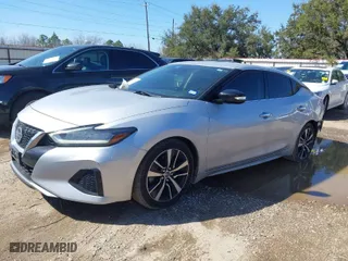 2021 Nissan Maxima SV with VIN 1N4AA6CV0MC501153, listed as a IAAI auction lot 41650382 with 56,686 mi miles. Bid and sale history available at carsss.com. Image 2.