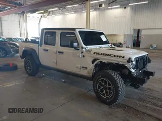 2024 Jeep Gladiator Rubicon z VIN 1C6JJTBG0RL107582, wystawiony jako IAAI lot #41547970 z przebiegiem 16 653 mil mil oraz . Historia ofert i sprzedaży dostępna na DreamBid. Obrazek 1.
