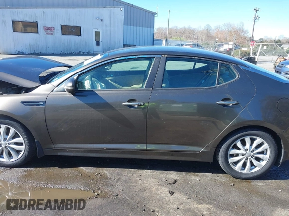 2014 Kia Optima EX z VIN 5XXGN4A78EG320367, wystawiony jako IAAI lot #41858824 z przebiegiem 216 987 mil mil oraz . Historia ofert i sprzedaży dostępna na DreamBid. Obrazek 14.