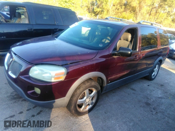2006 Pontiac Montana SV6 with VIN 1GMDV33LX6D229549, listed as a IAAI auction lot 34789099 with 236,978 mi miles. Bid and sale history available at carsss.com. Image 2.