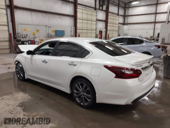 2018 Nissan Altima SV with VIN 1N4AL3AP9JC271718, listed as a IAAI auction lot 41787242 with 73,523 mi miles and . Bid and sale history available at carsss.com. Image 3.