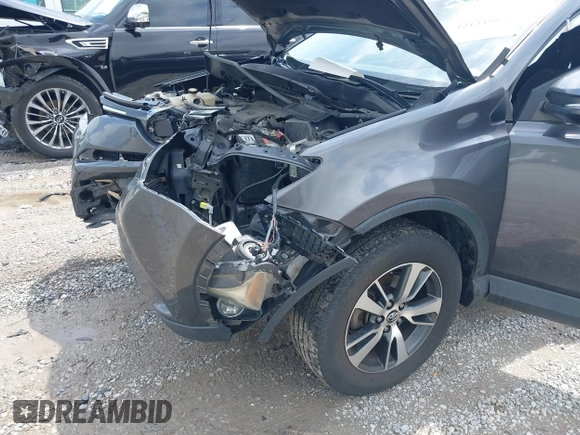 2018 Toyota RAV4 XLE z VIN 2T3WFREV8JW429188, wystawiony jako IAAI lot #42121963 z przebiegiem 133 462 mil mil oraz . Historia ofert i sprzedaży dostępna na DreamBid. Obrazek 6.