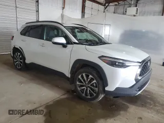 2023 Toyota Corolla Cross XLE with VIN 7MUDAABG7PV068968, listed as a Copart auction lot 51922695 with 43,911 mi miles and Salvage title. Bid and sale history available at DreamBid. Image 4.