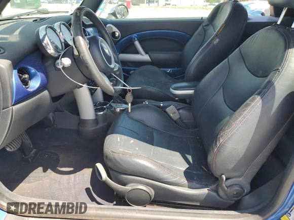 2006 MINI Convertible S with VIN WMWRH33566TK58973, listed as a Copart auction lot 51295575 with Not provided miles and Salvage title. Bid and sale history available at DreamBid. Image 7.