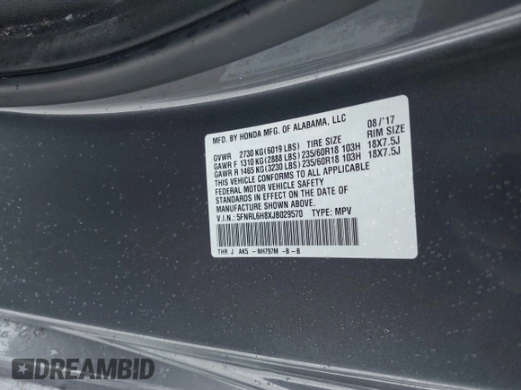 2018 Honda Odyssey Touring with VIN 5FNRL6H8XJB029570, listed as a IAAI auction lot 41485794 with 77,601 mi miles. Bid and sale history available at carsss.com. Image 9.