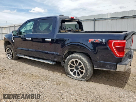 2021 Ford F-150 XL with VIN 1FTFW1E80MFA32611, listed as a Copart auction lot 61899255 with 98,278 mi miles and Salvage title. Bid and sale history available at DreamBid. Image 2.